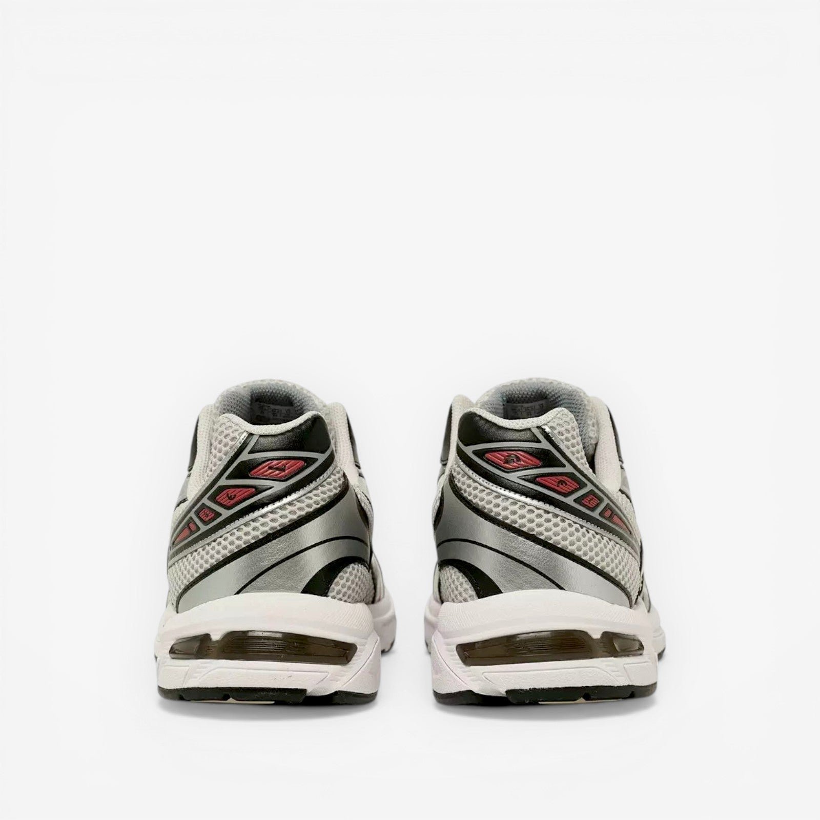 Rear view of silver and white ASICS sneakers with mesh details, ideal athletic footwear