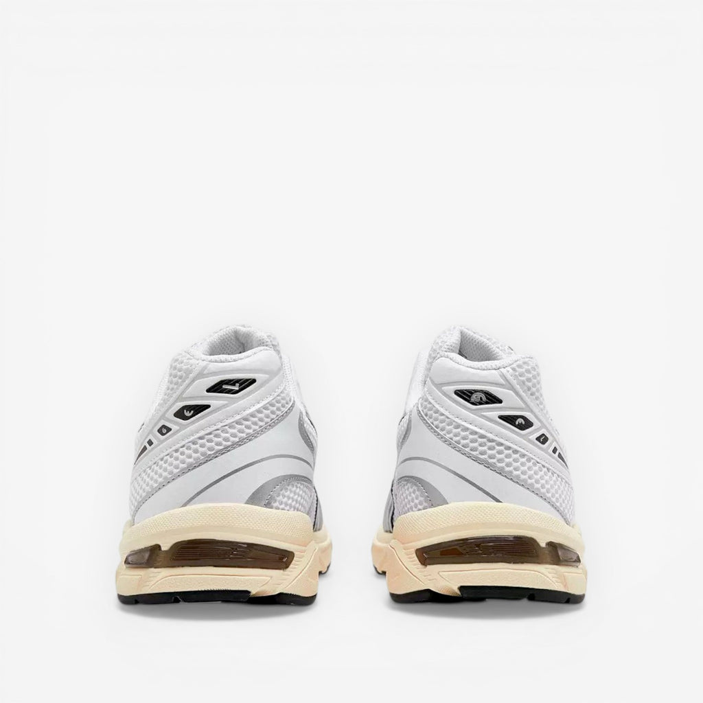 rear view of white ASICS sneakers with mesh and cream soles, footwear, sneakers