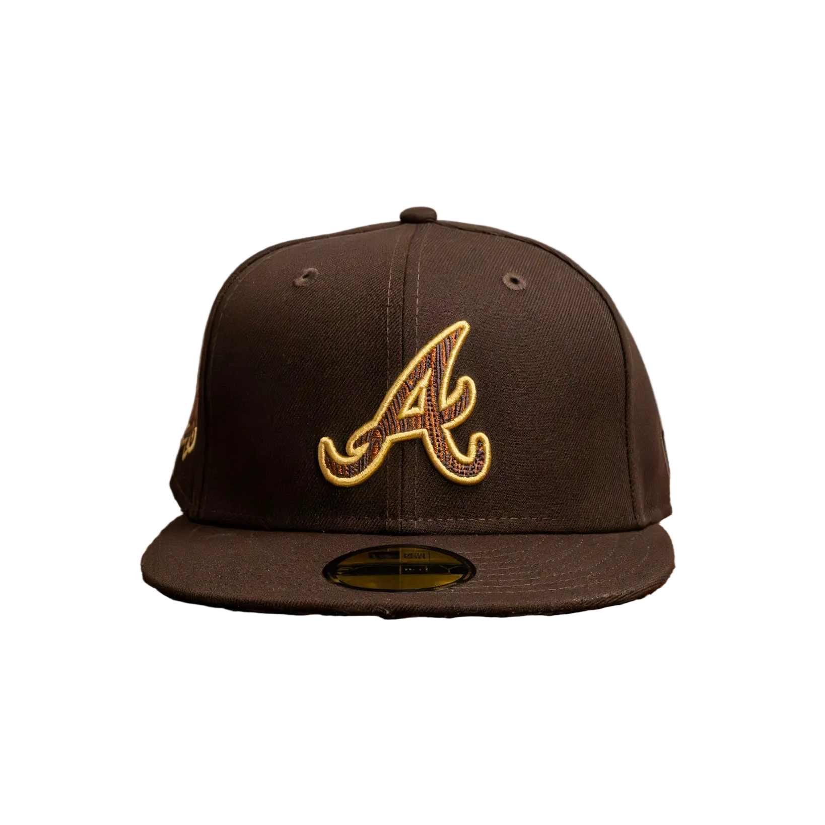Black New Era fitted cap with gold embroidered A logo, sneakers and hats keywords