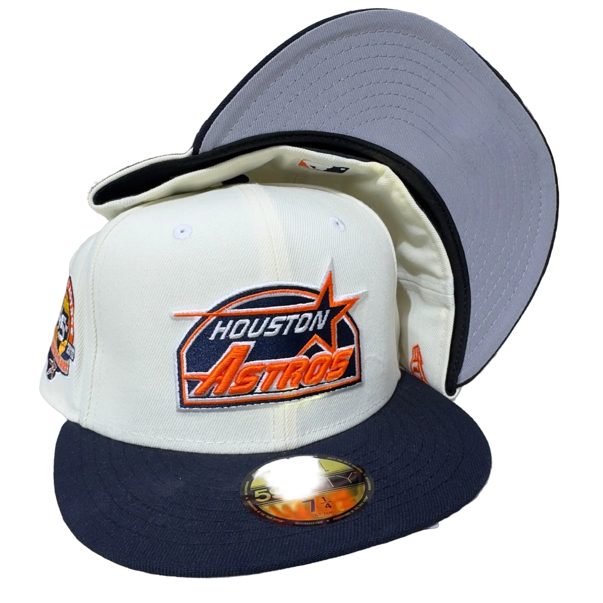 Houston Astros fitted cap, New Era logo, navy brim, cream crown, embroidered side patch