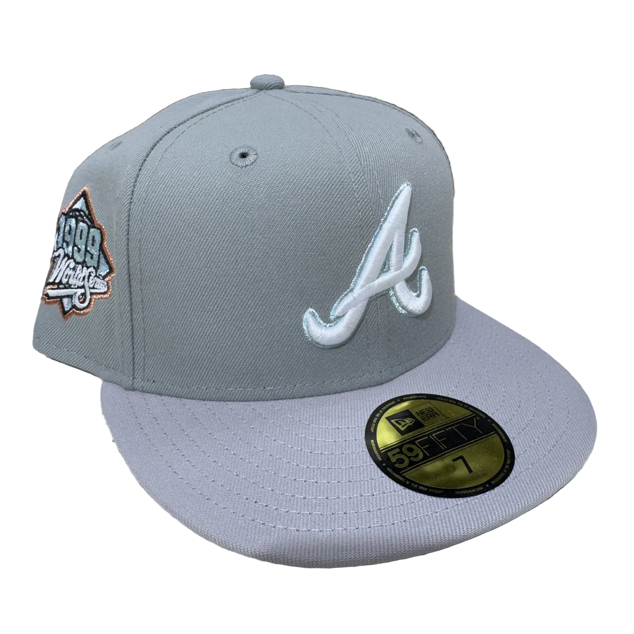 grey New Era fitted cap with embroidered A logo and 1999 World Series patch