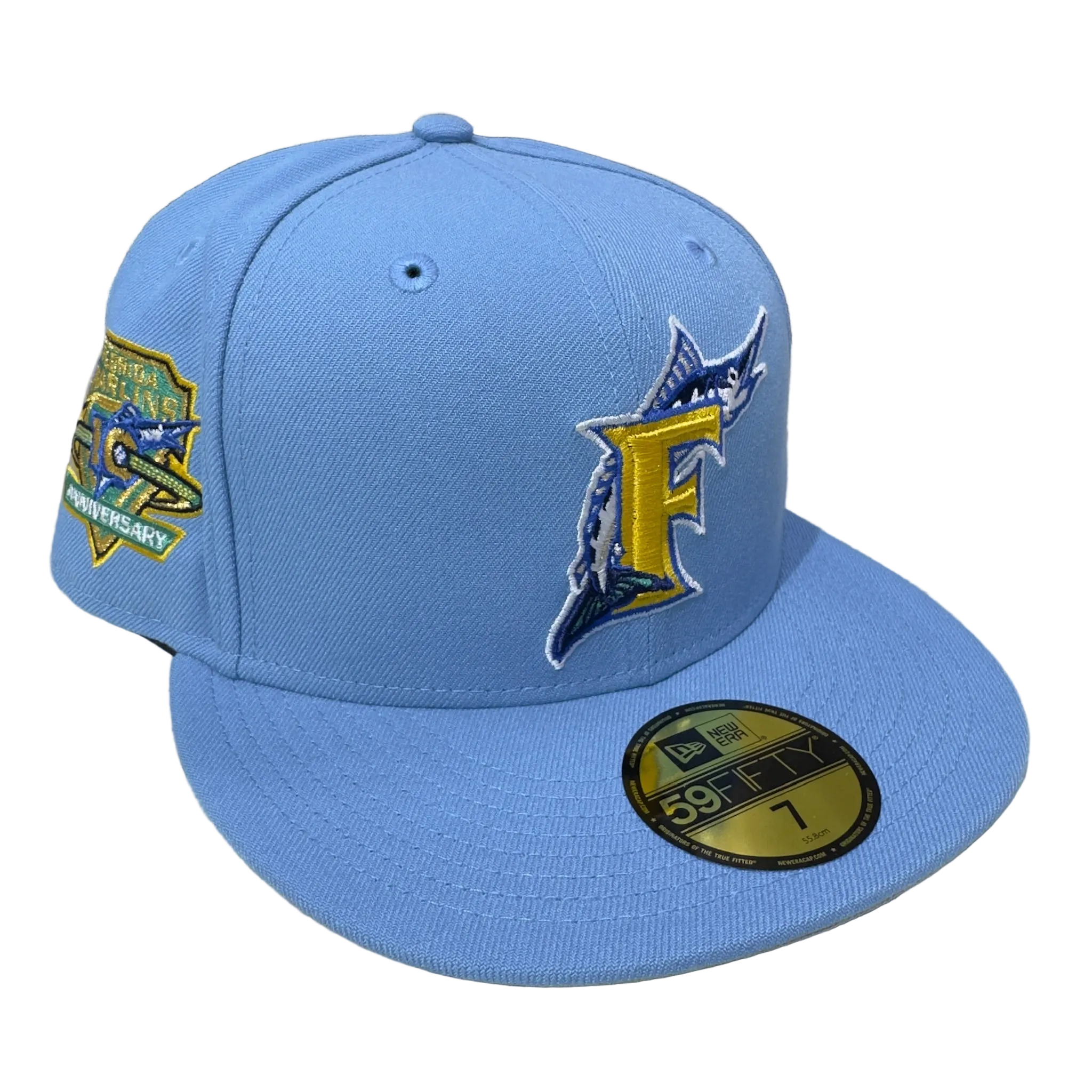 Light blue New Era fitted cap with embroidered F and marlin, side patch, 59Fifty sticker.