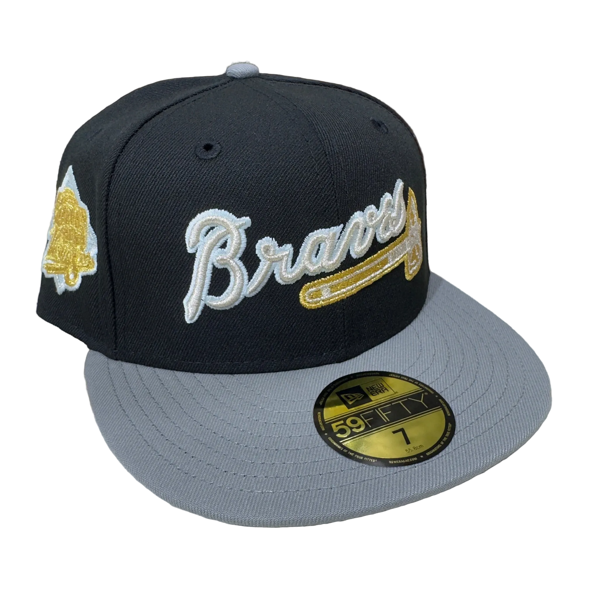 New Era fitted cap, black crown, grey brim, gold and white Braves script, athletic hat
