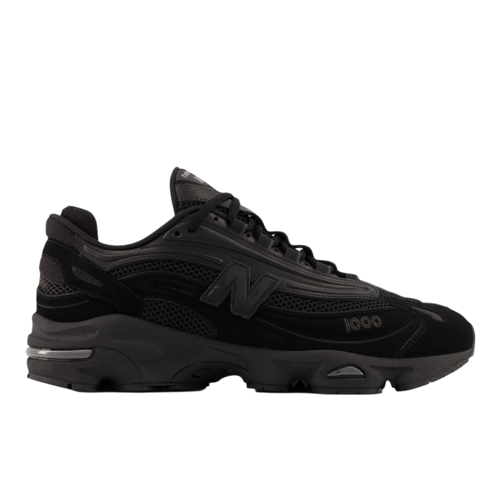 Black New Balance sneaker, mesh and suede, side profile, athletic footwear