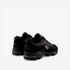 New Balance black sneakers, mesh and suede upper, bold N logo, premium footwear