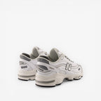 New Balance 1000 white sneakers, mesh and leather footwear, side and back view