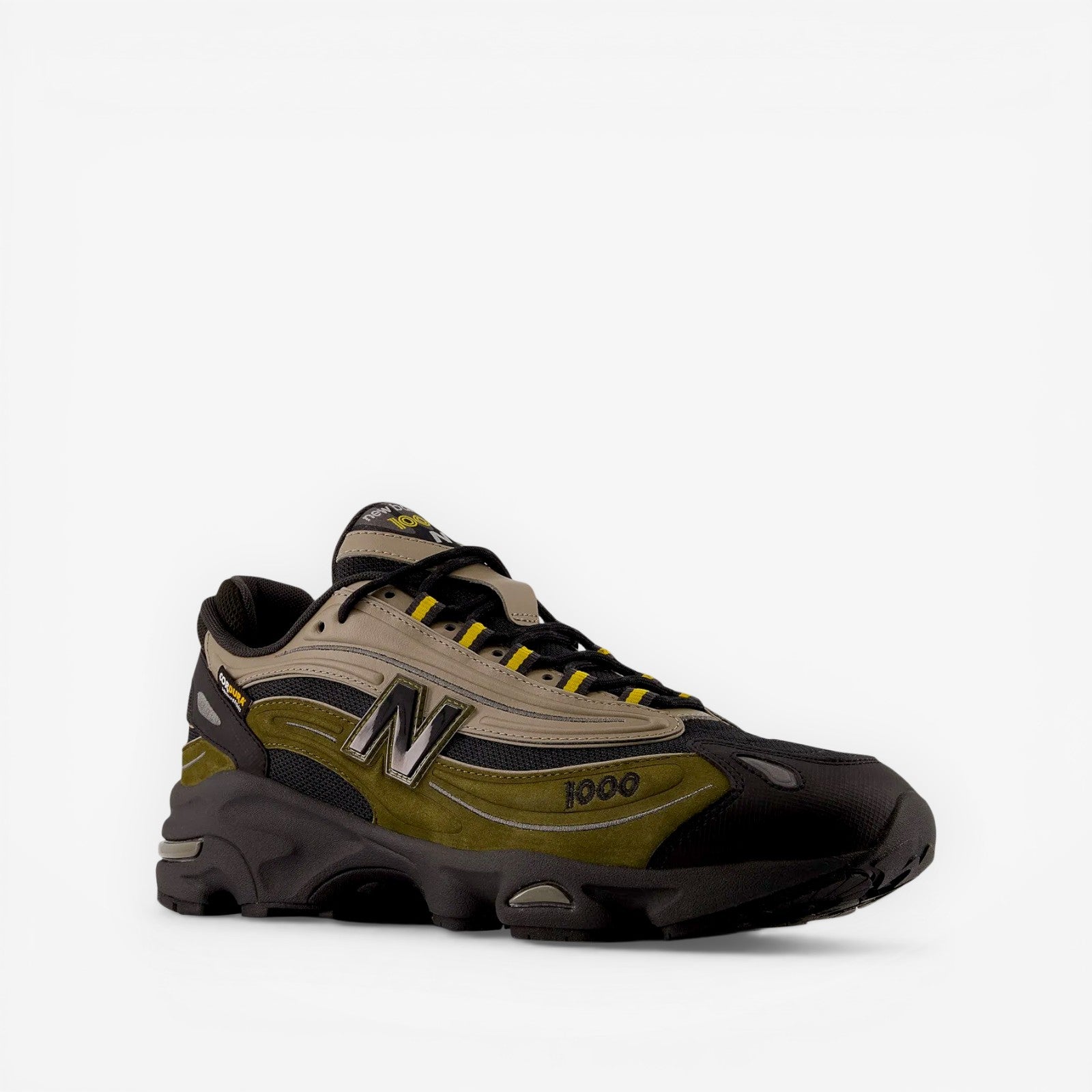 New Balance 1000 sneaker in black, olive, and beige with mesh and suede details