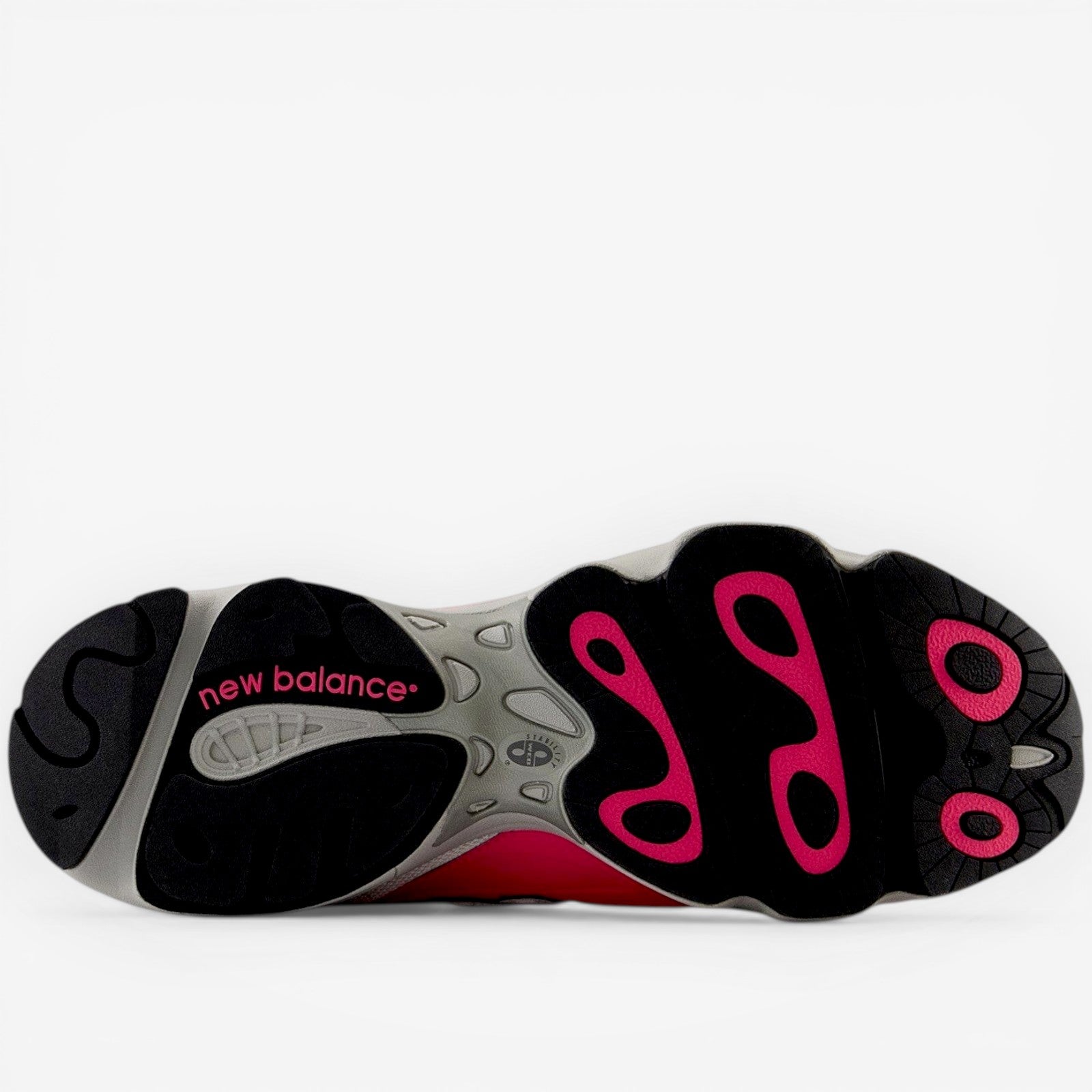 new balance sneaker outsole with black and pink tread, footwear close-up