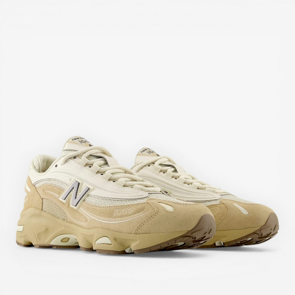 New Balance beige sneakers with suede and mesh details, premium footwear