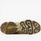 New Balance sneaker outsole, tan and brown, footwear detail for sneakers and ASICS fans