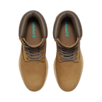 Pair of brown leather boots with laces on a white background