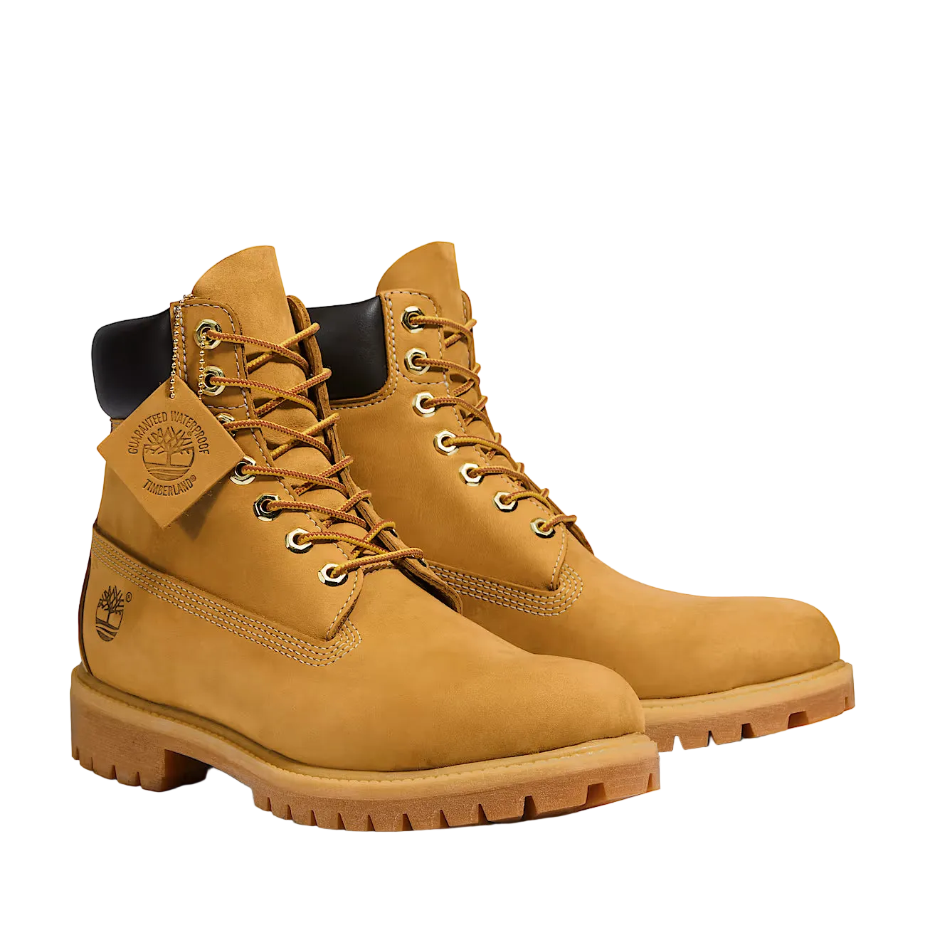 Pair of tan boots with a visible brand logo on a white background