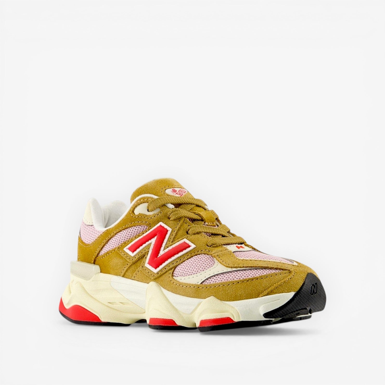 New Balance sneaker in tan, pink, and red with chunky sole, stylish footwear