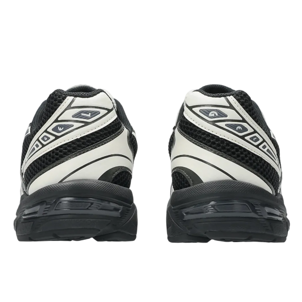 Back view of black and white new balance asics sneakers, mesh and leather footwear