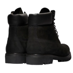 Black leather boots on a white background