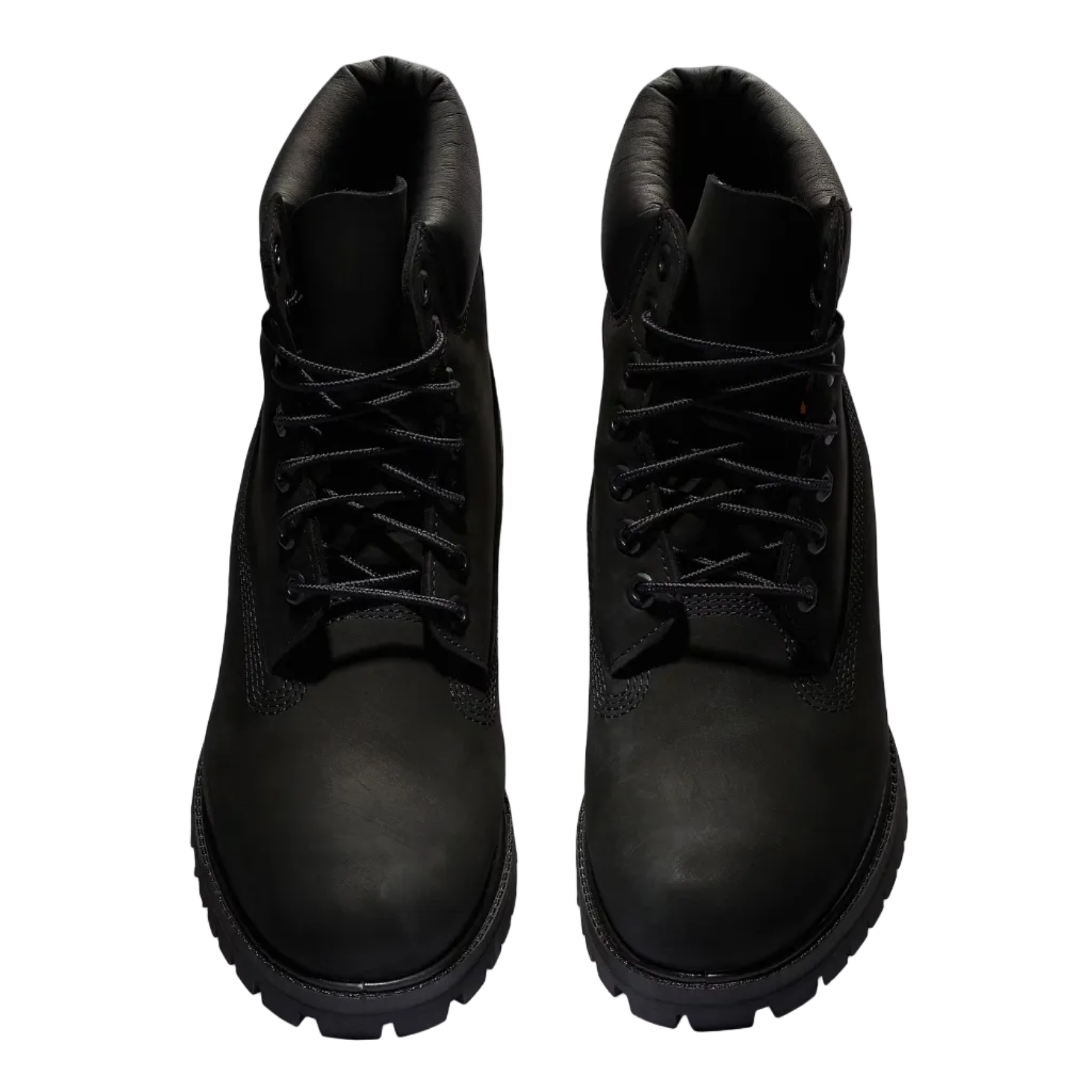 Pair of black leather boots on a white background