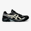 METRO ASICS GT-2160 sneaker in black mesh with beeswax yellow accents and silver detailing, side profile view.