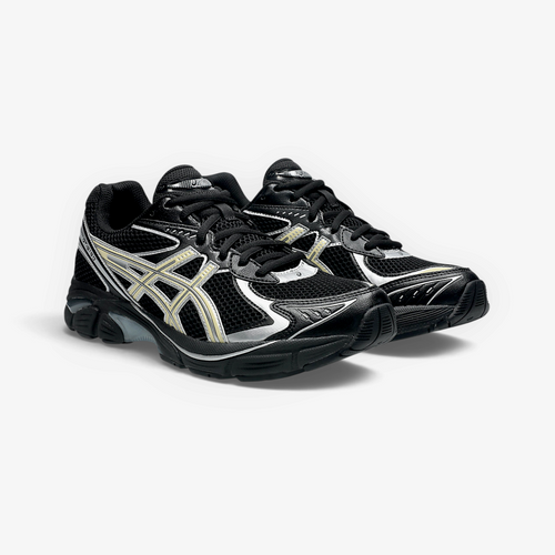 METRO ASICS GT-2160 sneakers in black with beeswax yellow accents, featuring mesh panels and GEL cushioning.