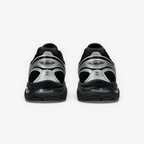 Rear view of METRO ASICS GT-2160 sneakers in black and silver with GEL cushioning and technical mesh detailing.