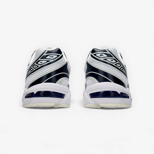METRO ASICS GEL-1130 retro running shoes in white and midnight blue, showing the heel cushioning and layered design.
