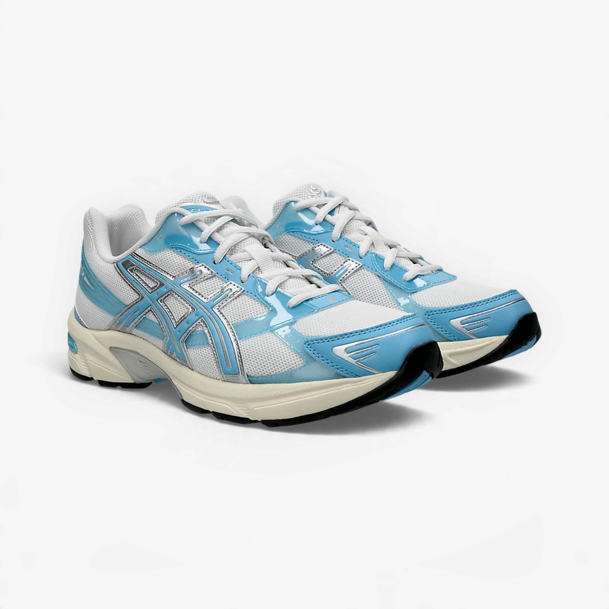 METRO ASICS GEL-1130 sneakers in white and storm cloud blue with glossy TPU overlays and a retro running silhouette.