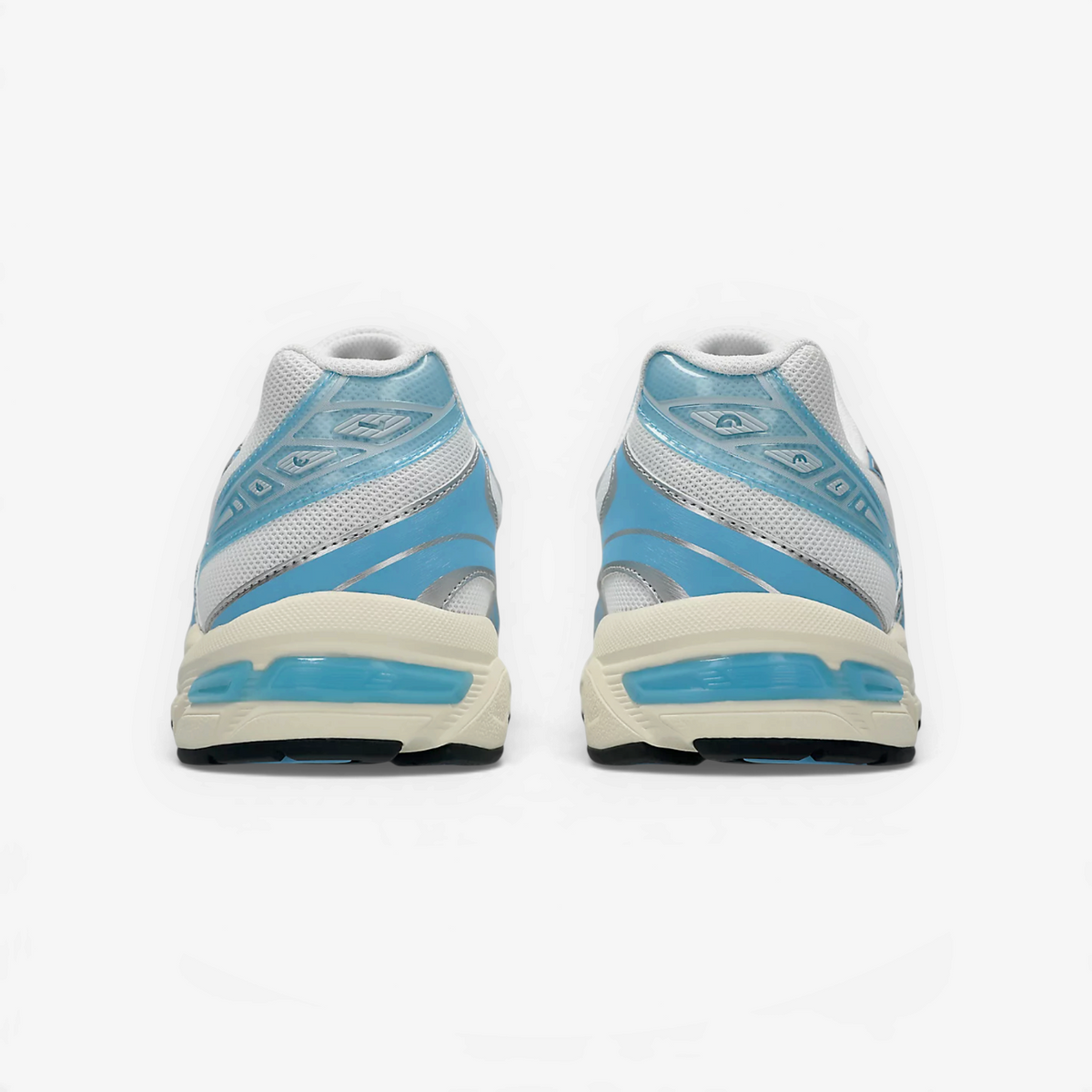 Rear view of METRO ASICS GEL-1130 sneakers in white and storm cloud blue with glossy TPU heel details