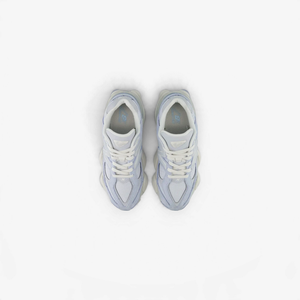METRO New Balance 9060 sneakers in vintage indigo and pumpernickel with mesh and suede upper, top-down view.