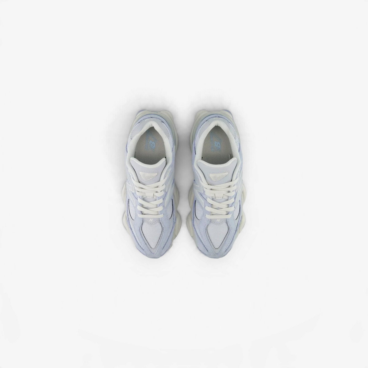 METRO New Balance 9060 sneakers in vintage indigo and pumpernickel with mesh and suede upper, top-down view.