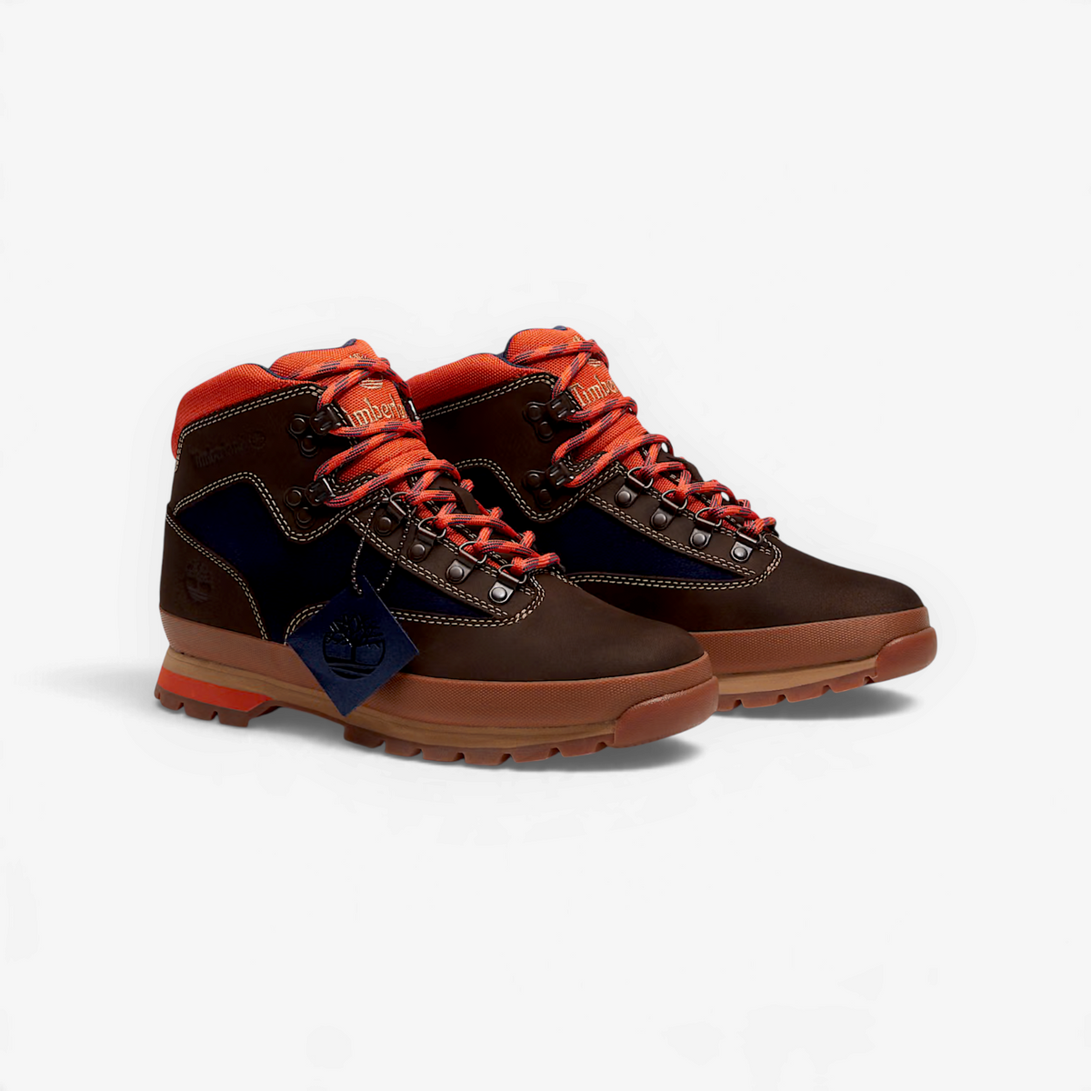 METRO Timberland Euro Hiker boots in dark brown nubuck and dark blue with orange accents and rugged rubber lug outsoles.