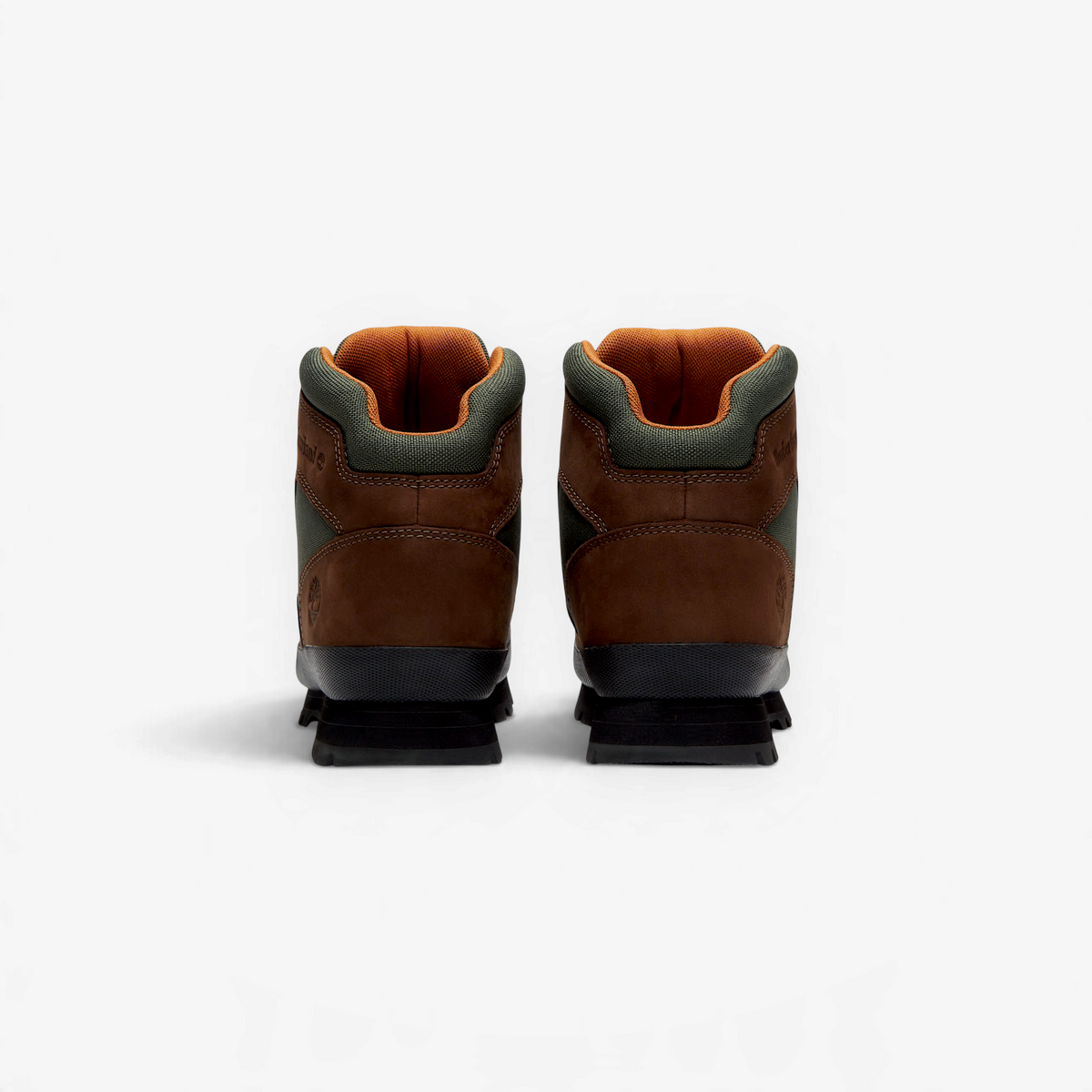 METRO Timberland Euro Hiker boots in dark brown nubuck and green mesh, shown from the back with a rubber lug sole.