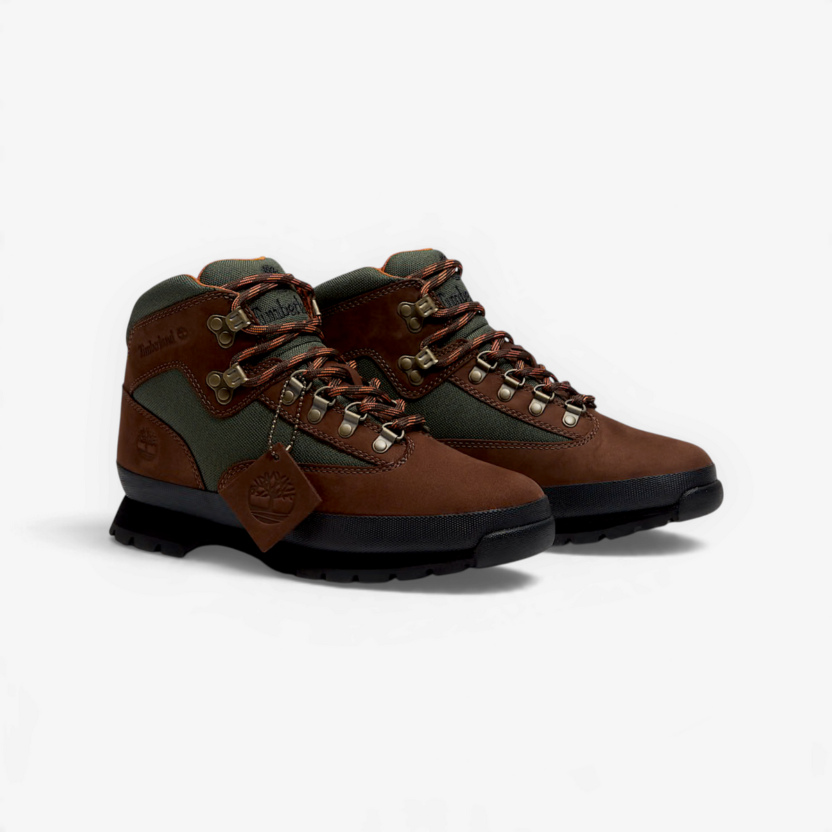 METRO Timberland Euro Hiker boots in dark brown nubuck and green mesh with speed-lace hardware and rubber lug outsole.