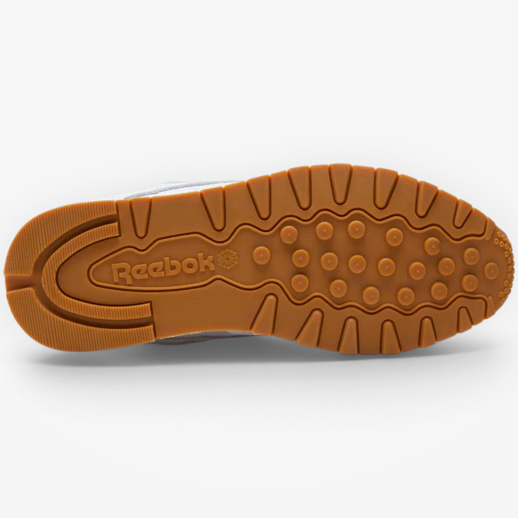 METRO Reebok Classic Leather sneaker featuring a durable gum rubber outsole with a textured grip pattern