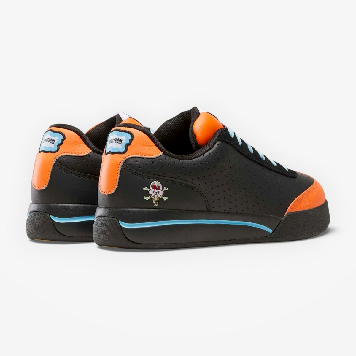 METRO Reebok x ICECREAM Board Flip sneakers in black suede with orange and blue accents and heel logo detail
