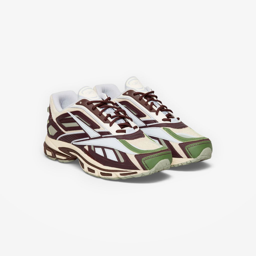 METRO Reebok Premier Road Ultra sneakers in dark cocoa, tranquil blue, and vintage chalk with a paneled design.