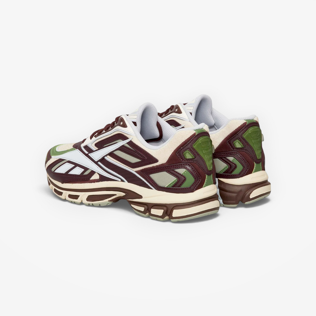 METRO Reebok Premier Road Ultra sneakers in dark cocoa, tranquil blue, and vintage chalk with a paneled design.