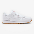 METRO Reebok Classic Leather sneakers in white leather with grey accents and a gum rubber outsole, side profile view.