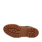Close-up of a brown boot sole with brand logo on a white background