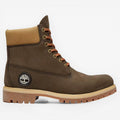 METRO Timberland Premium 6-Inch Waterproof Boot in dark brown leather with tan collar and orange-brown laces. Features lug sole.