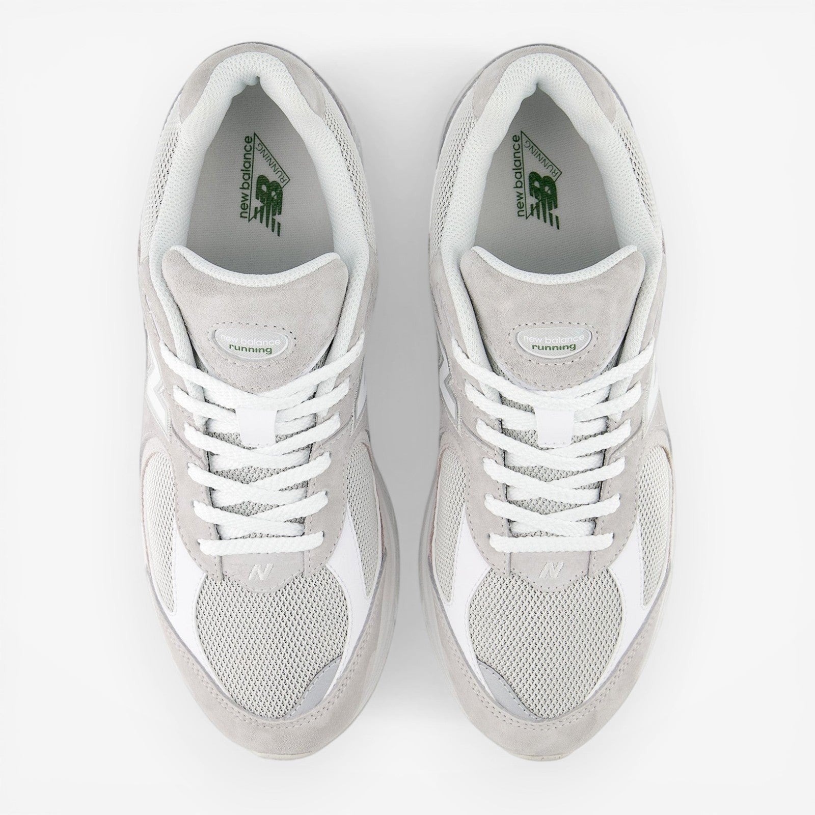 new balance grey and white sneakers with mesh and suede upper, top view, footwear