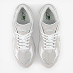new balance grey and white sneakers with mesh and suede upper, top view, footwear