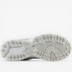 new balance sneaker outsole with white patterned tread, athletic footwear design
