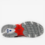 new balance sneaker outsole, grey and red, detailed tread, premium footwear
