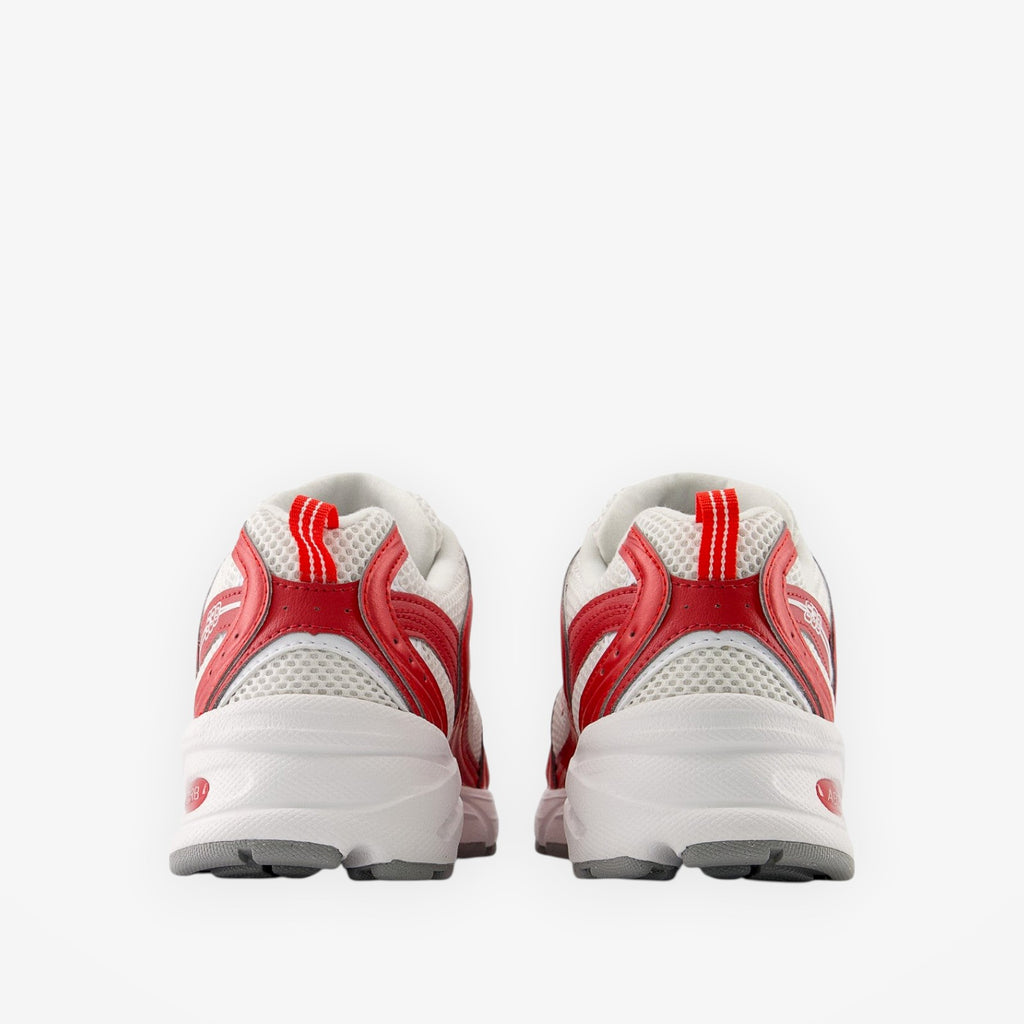 White and red new balance sneakers, rear view, mesh and leather footwear design