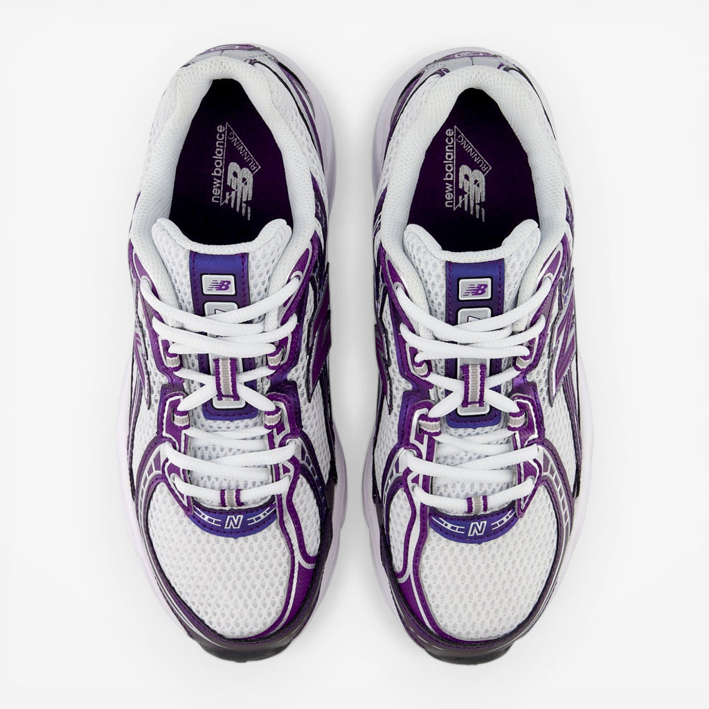 White and purple New Balance sneakers, mesh upper, top view, athletic footwear