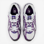 White and purple New Balance sneakers, mesh upper, top view, athletic footwear