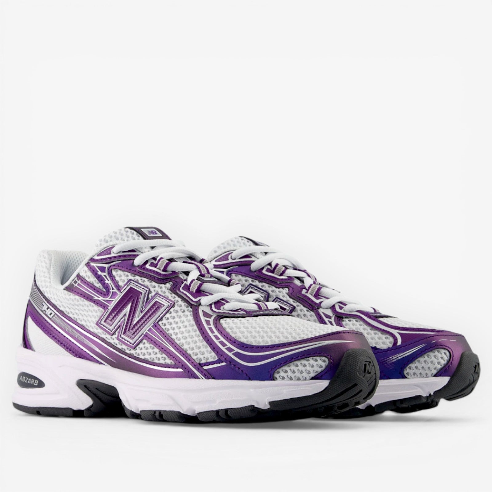 New Balance sneakers in white and purple, mesh upper, side N logo, athletic footwear