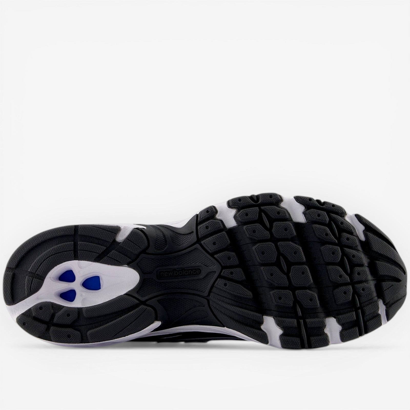 new balance sneaker outsole black and white with blue accents, footwear detail