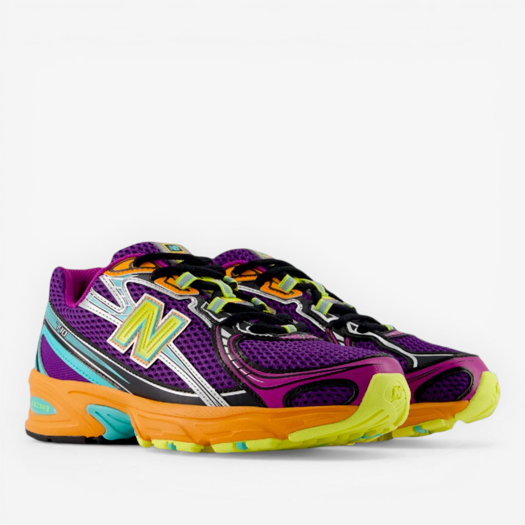 Purple mesh New Balance sneakers with vibrant yellow, orange, aqua details, footwear, sneakers