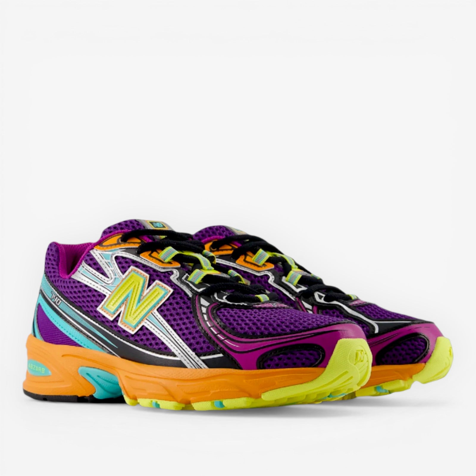 Purple mesh New Balance sneakers with vibrant yellow, orange, aqua details, footwear, sneakers