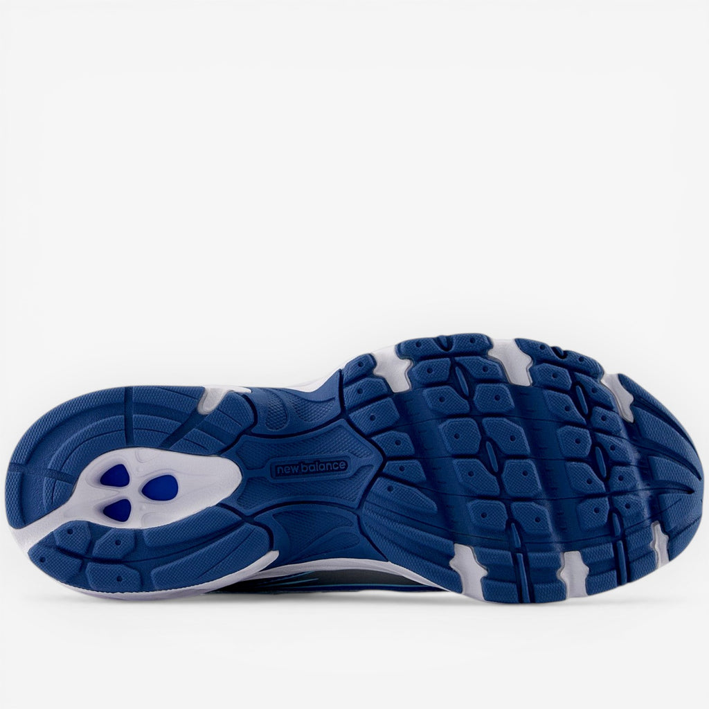 New Balance sneaker outsole in blue and white, athletic footwear with textured grip.
